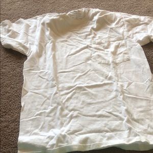 Plain white teeshirt with front left pockets